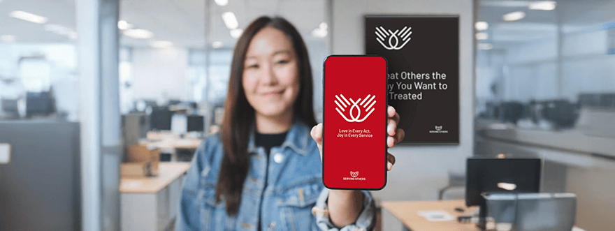 Woman holding up phone